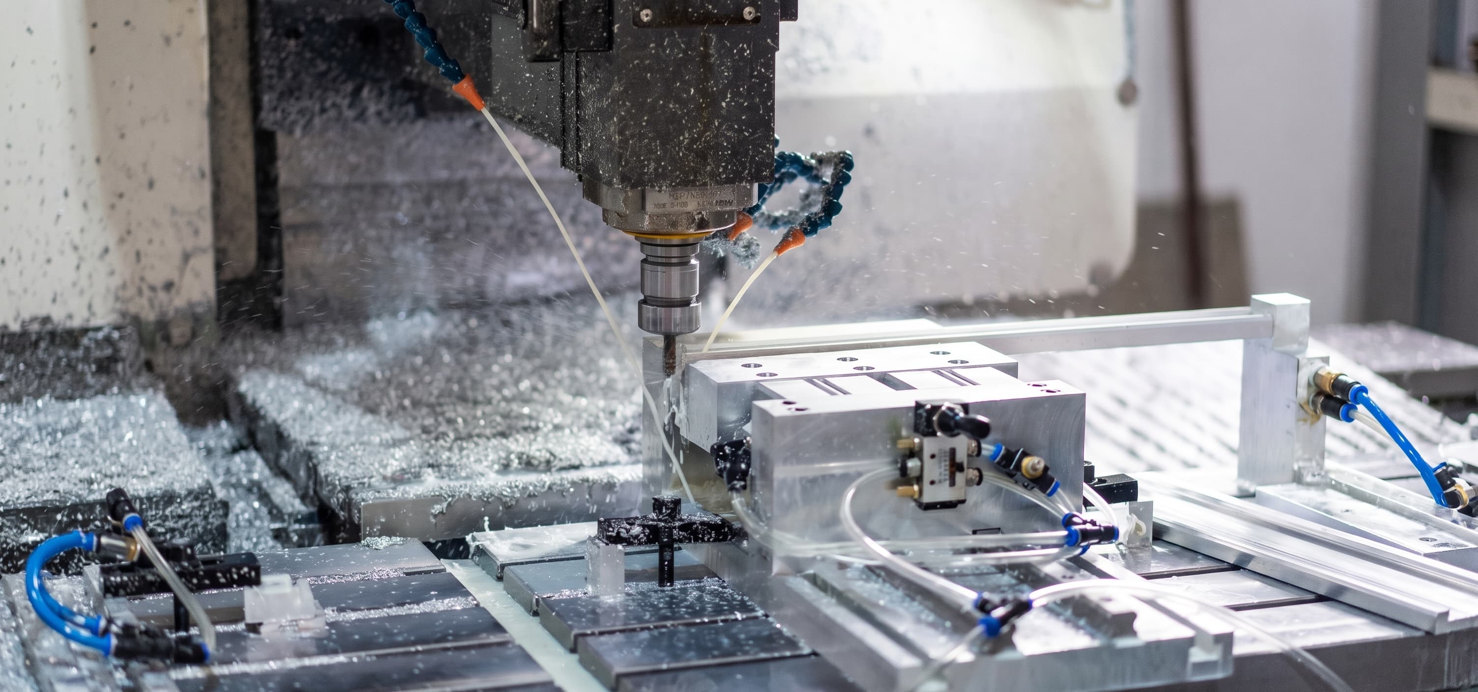 CNC spindle cutting a metal part